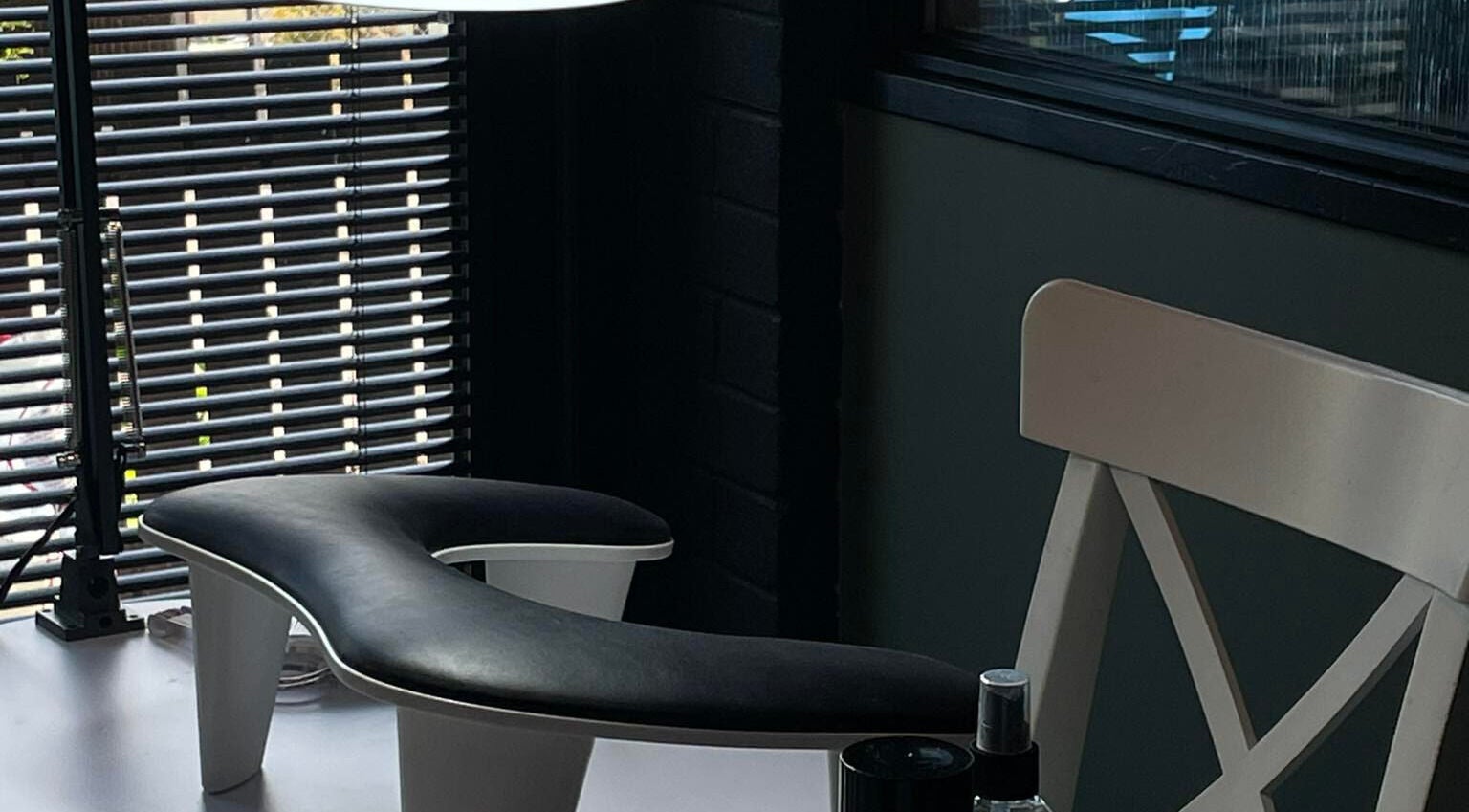 Cozy nail treatment area at Nails by Delle, Dingwall, Scotland, GB with stylish chair and window blinds.