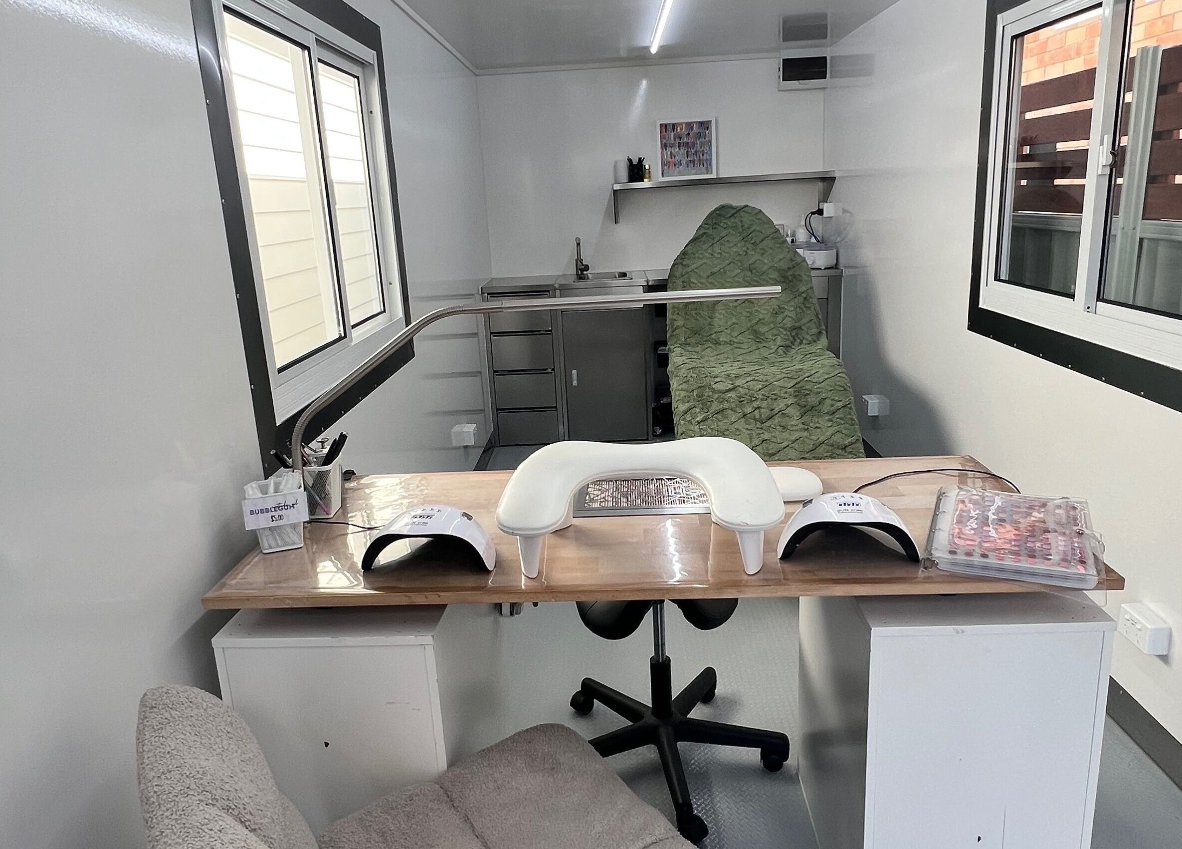 Modern nail station at Acryluxe Nails and Beauty, Dubbo, New South Wales, AU with serene ambiance.