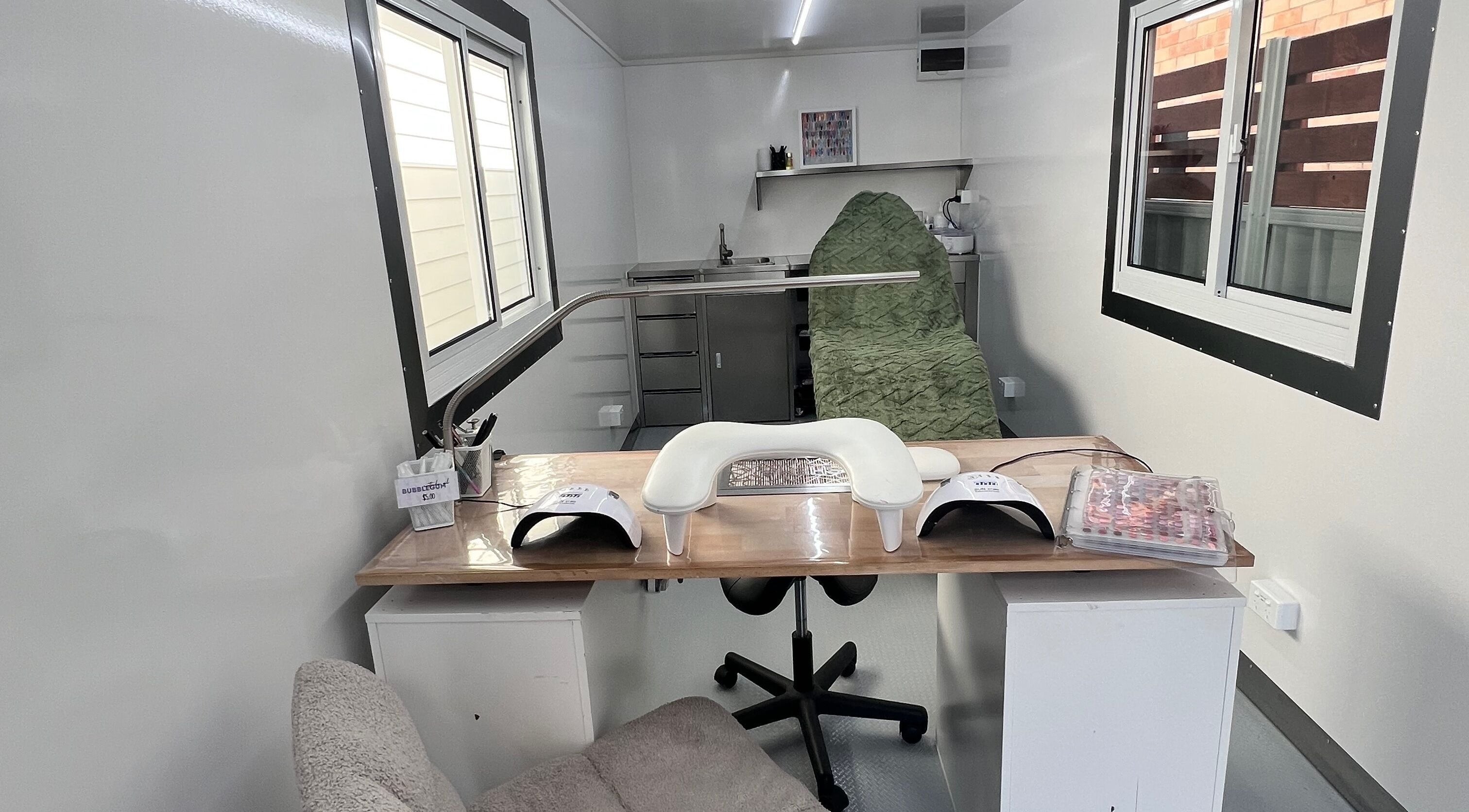 Modern nail station at Acryluxe Nails and Beauty, Dubbo, New South Wales, AU with serene ambiance.