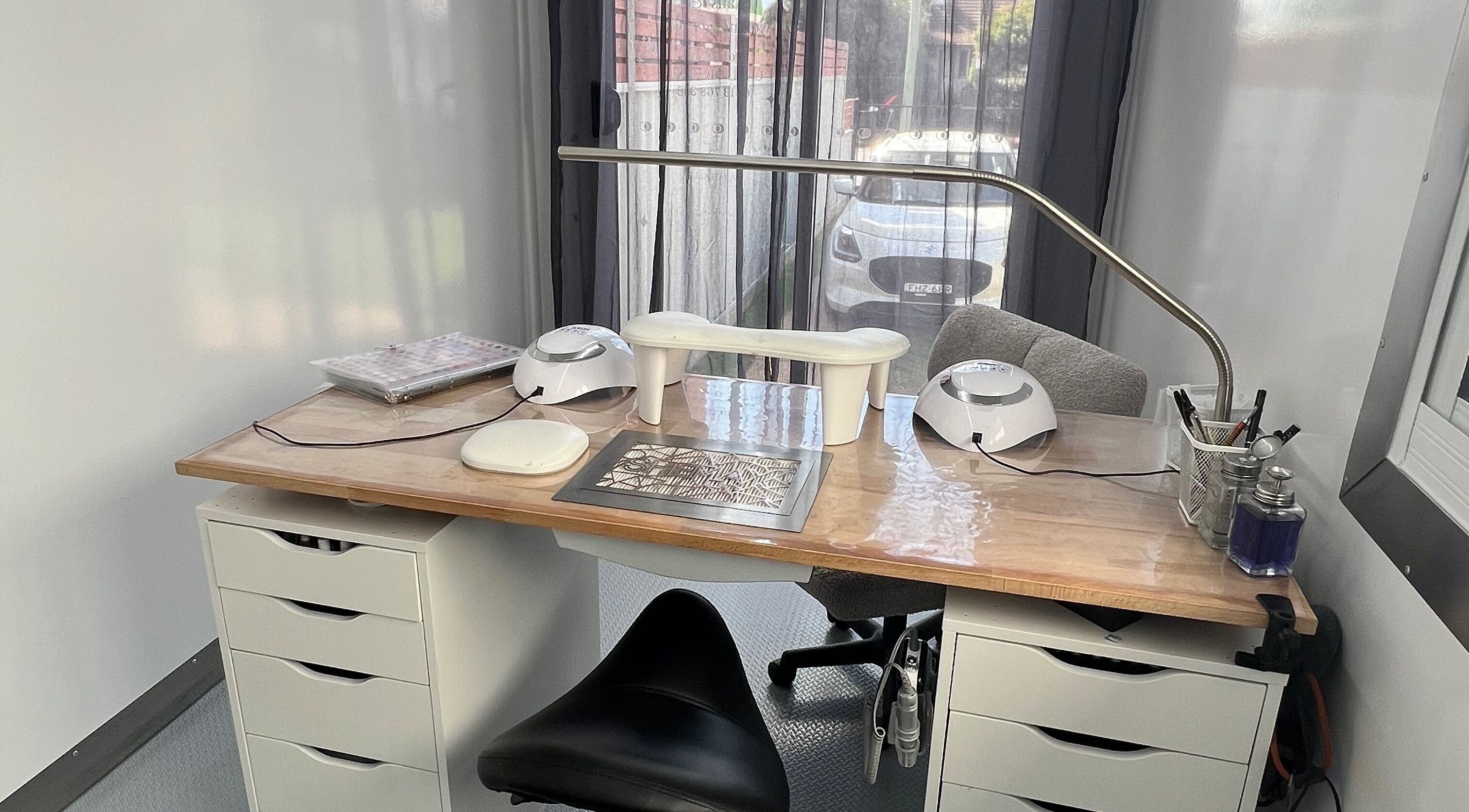 Manicure station at Acryluxe Nails and Beauty in Dubbo, New South Wales, AU, featuring modern equipment.