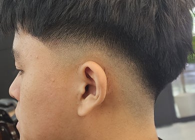 Close-up of a precision fade haircut at Noble Blade Housecall Barber, Selangor, Selangor, MY.