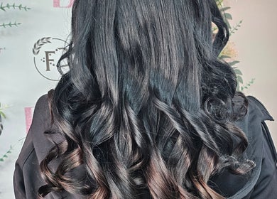 Glamorous curled hairstyle at Flawless Boutique Bispham, Blackpool, England, GB.