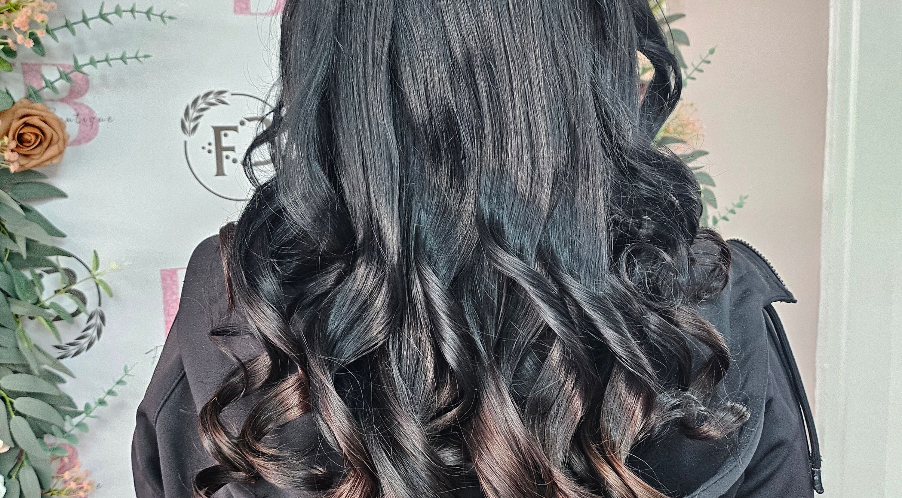 Glamorous curled hairstyle at Flawless Boutique Bispham, Blackpool, England, GB.