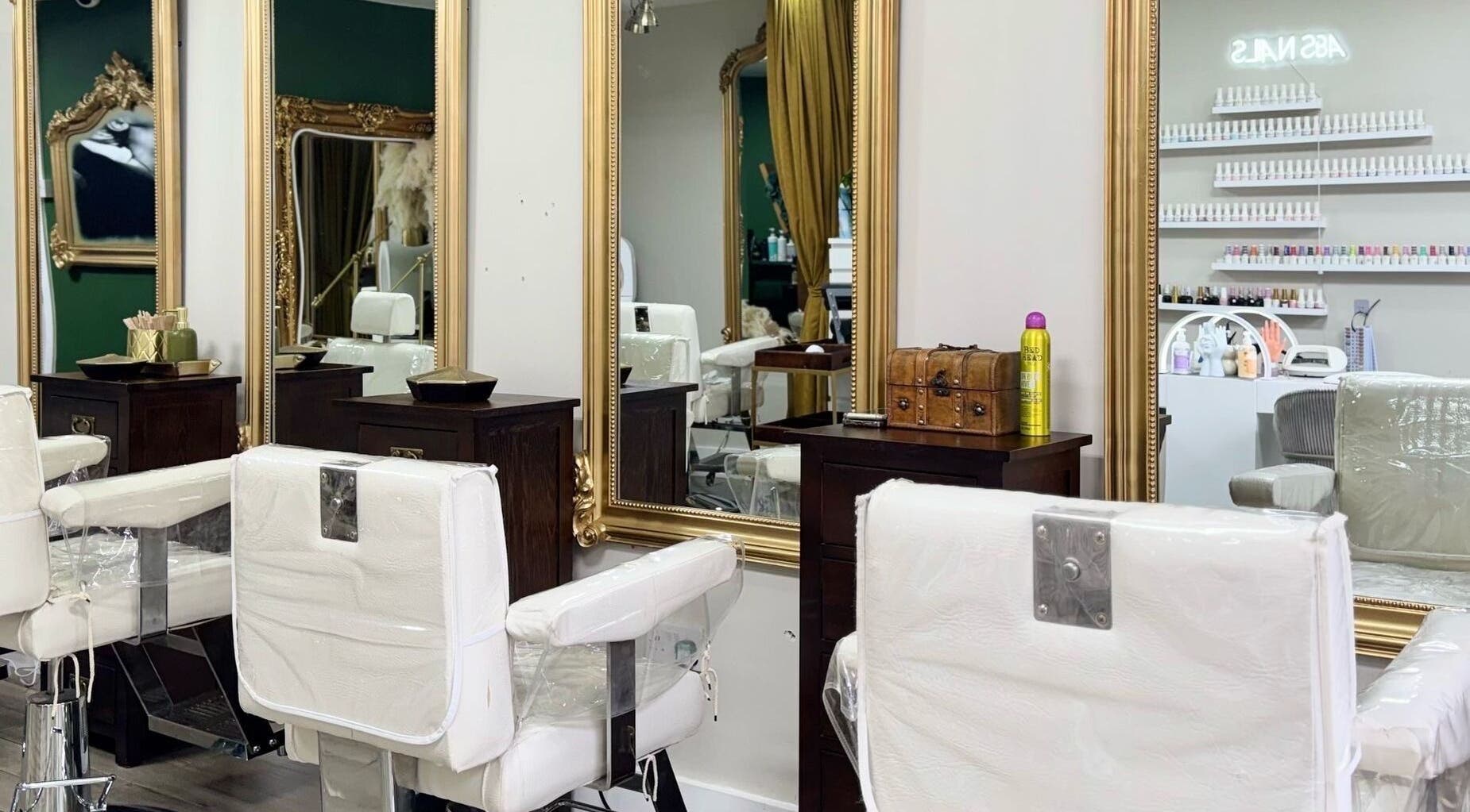 Elegant salon chairs and mirrors at A&S Hair and Beauty Salon in London, England, GB showcase luxury.