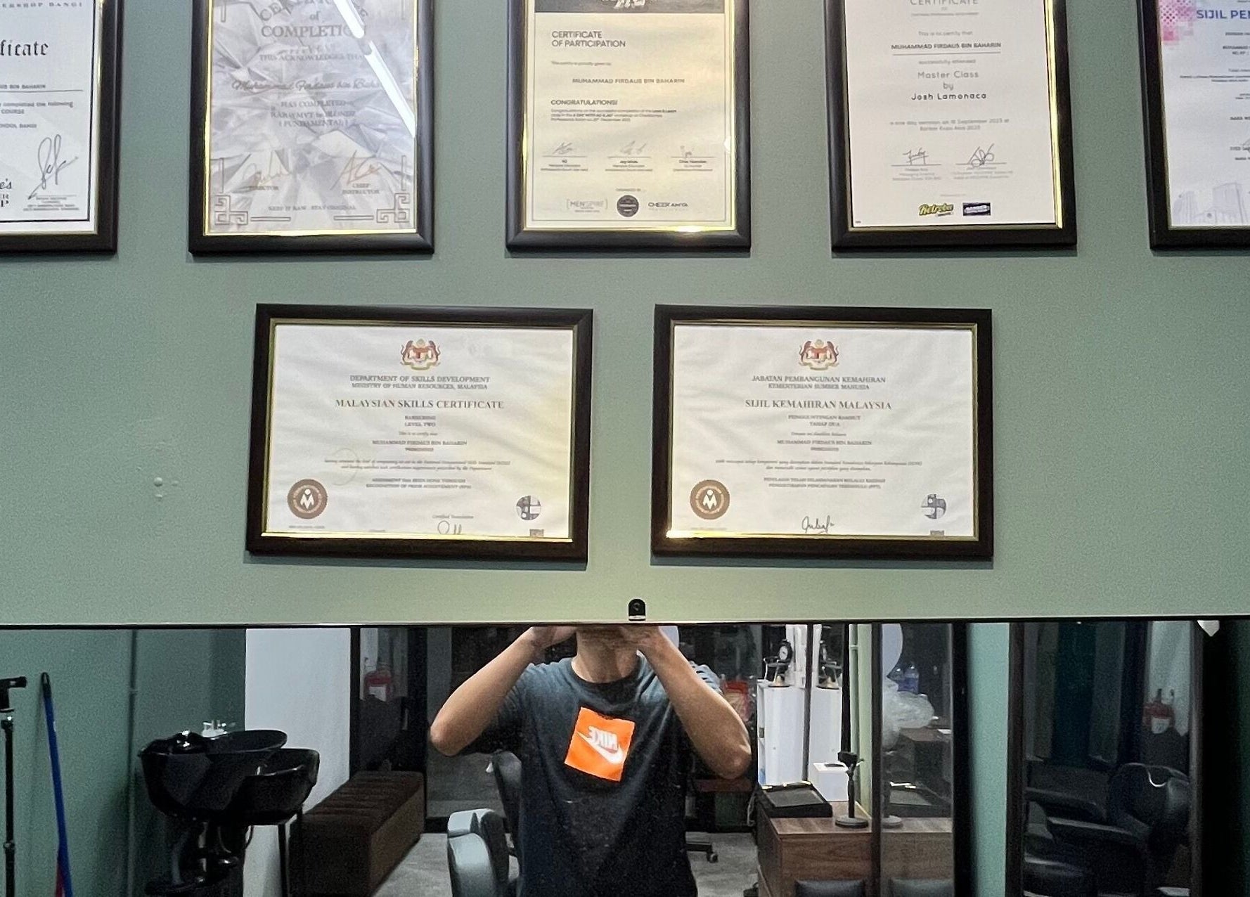 Certificates at Ayos Barbershop, Batu Caves, Selangor, MY showcasing expertise and professionalism.