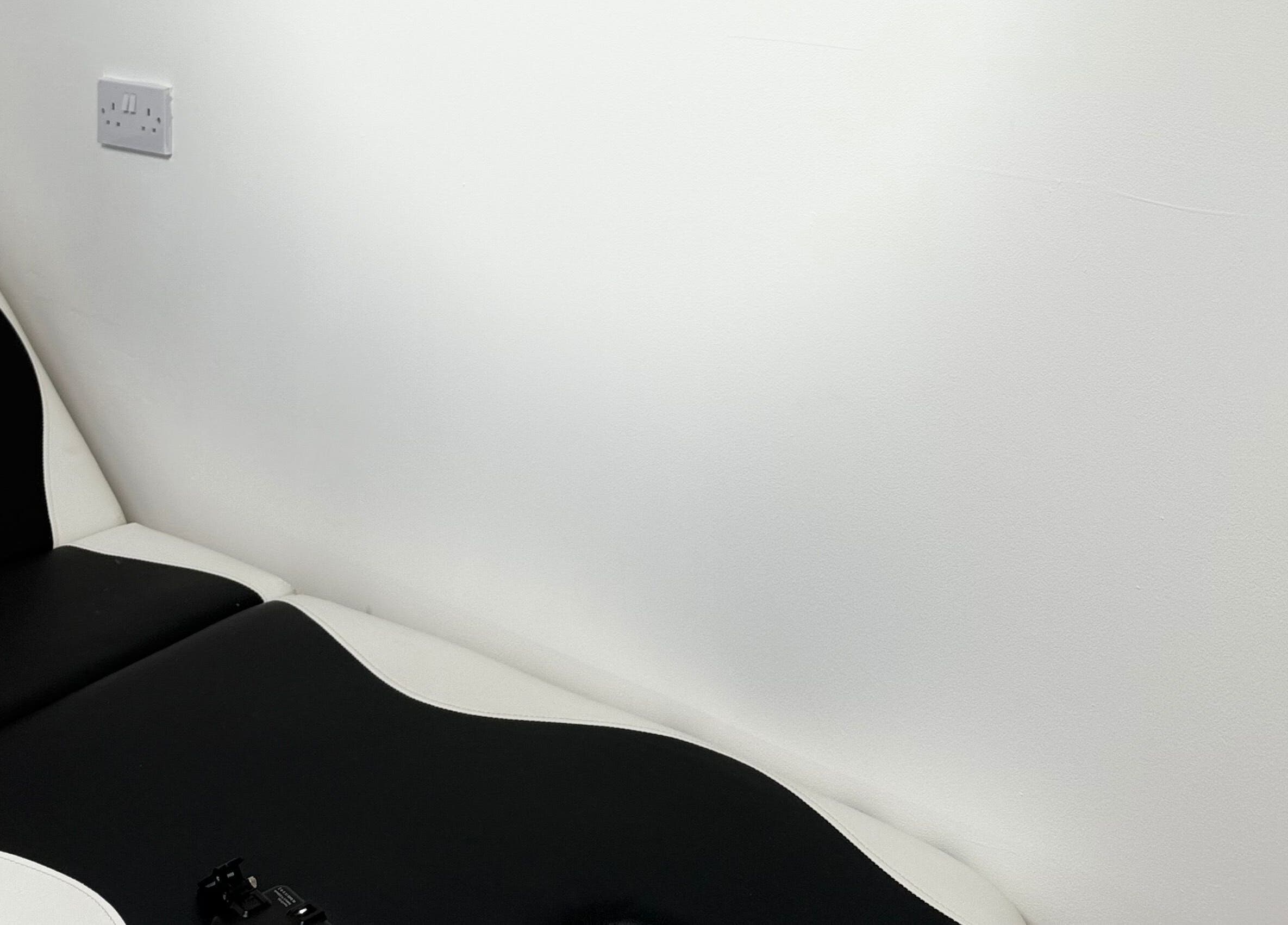 Comfortable modern treatment chair at Nu Faces by Georgina in Wakefield, England, GB, highlighting clean design.