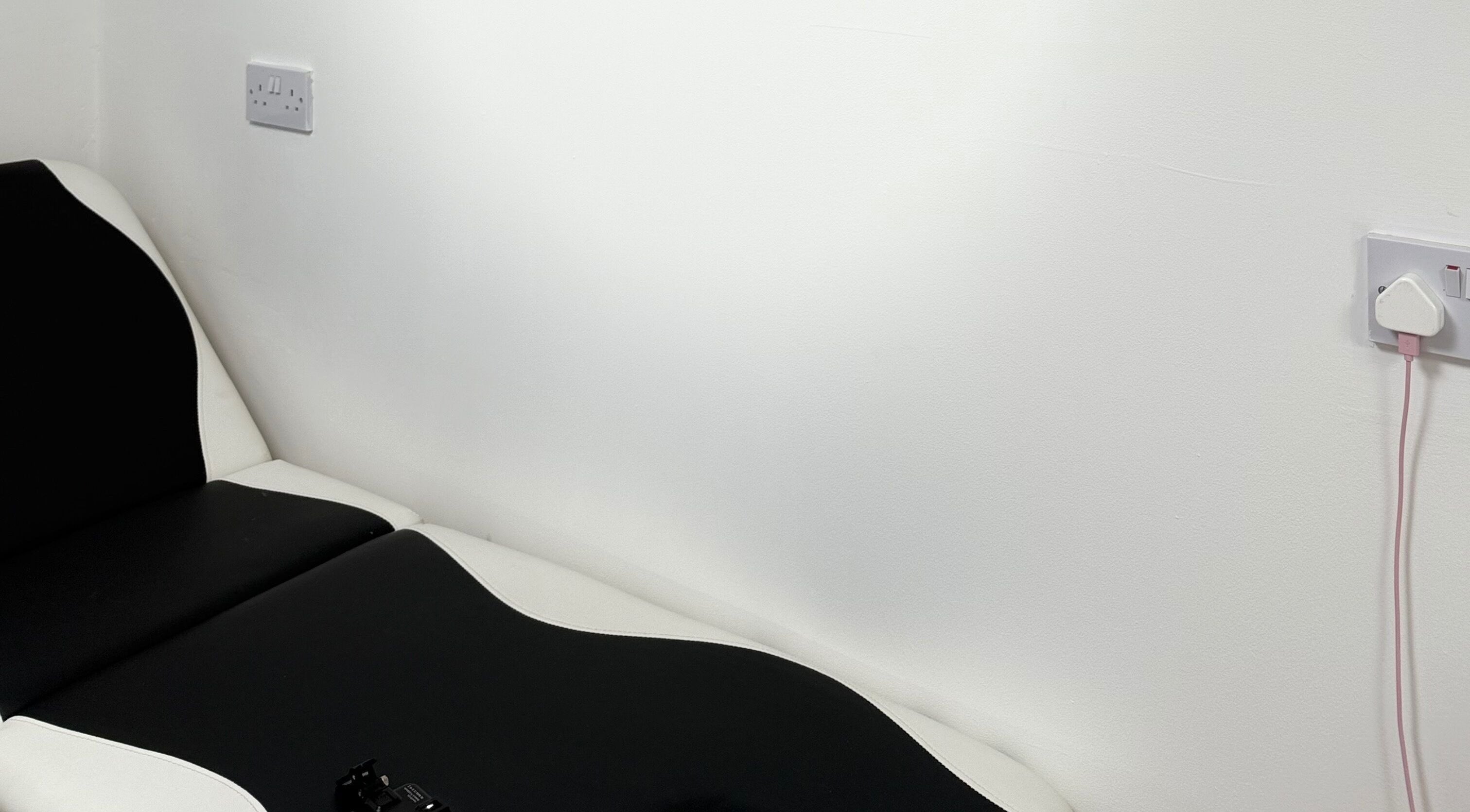 Comfortable modern treatment chair at Nu Faces by Georgina in Wakefield, England, GB, highlighting clean design.