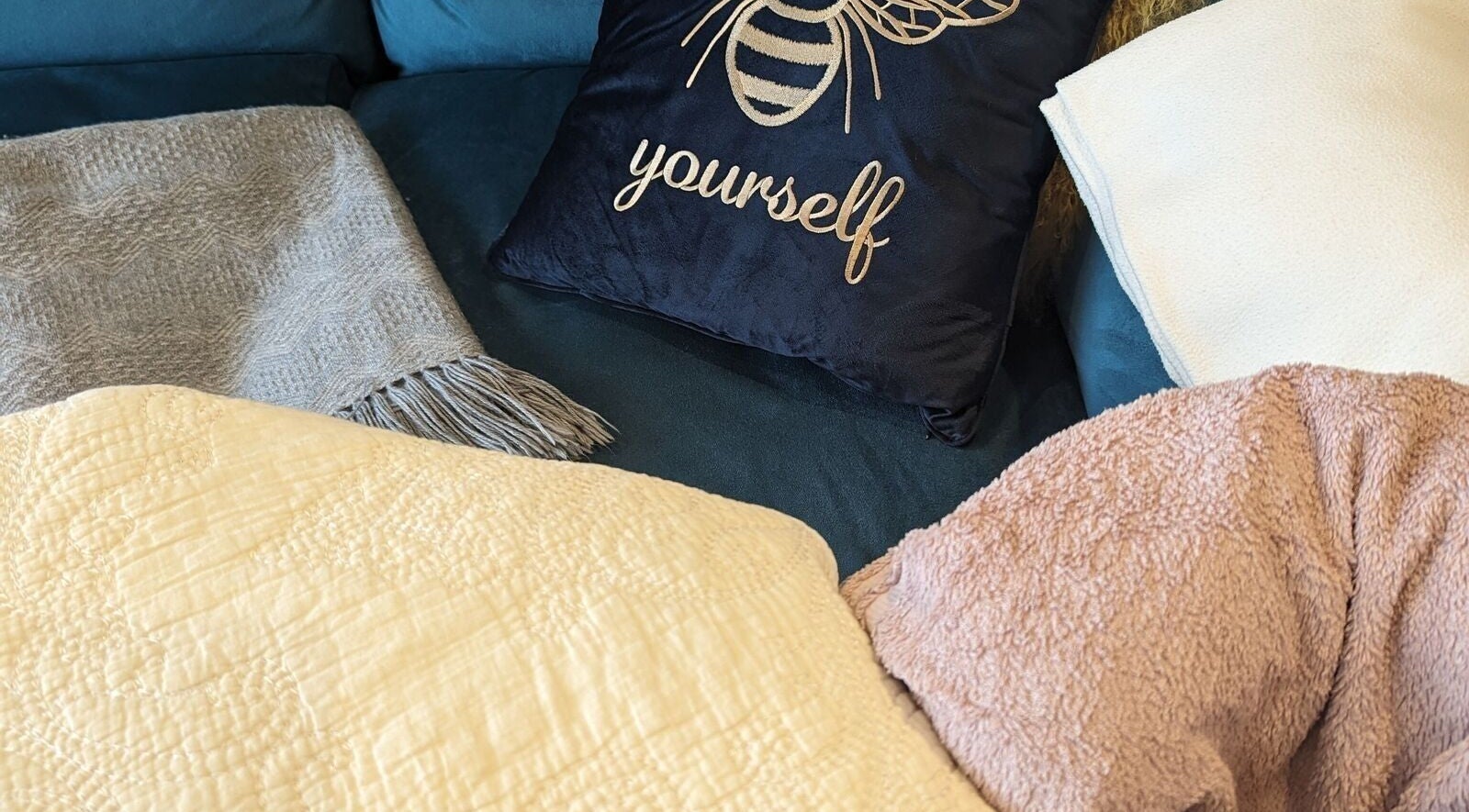 Relaxing blankets and cushion at Liz's Mobile Massage Canterbury, enhancing comfort in Canterbury, England, GB.