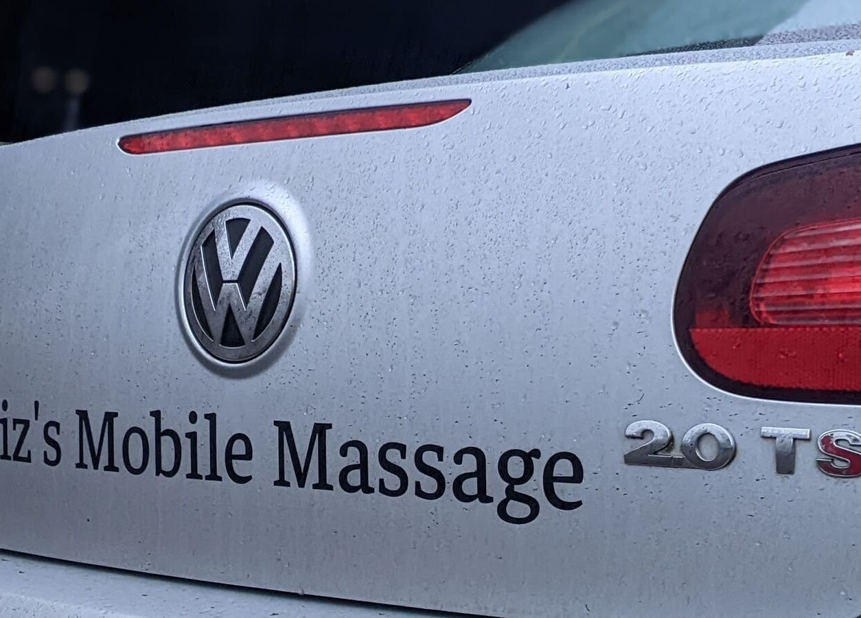 Rear view of Liz's Mobile Massage Sittingbourne car in England, England, GB, with brand logo.