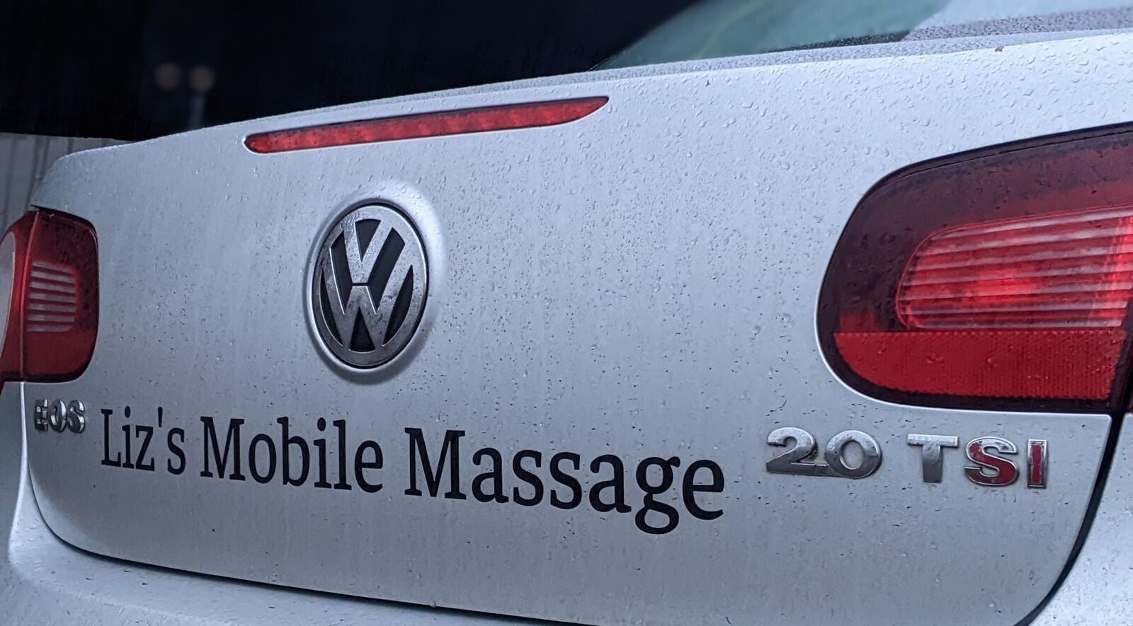 Rear view of Liz's Mobile Massage Sittingbourne car in England, England, GB, with brand logo.