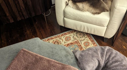 Cozy massage area at Liz's Mobile Massage Medway in Gillingham, England, GB with plush towels and warm rug.