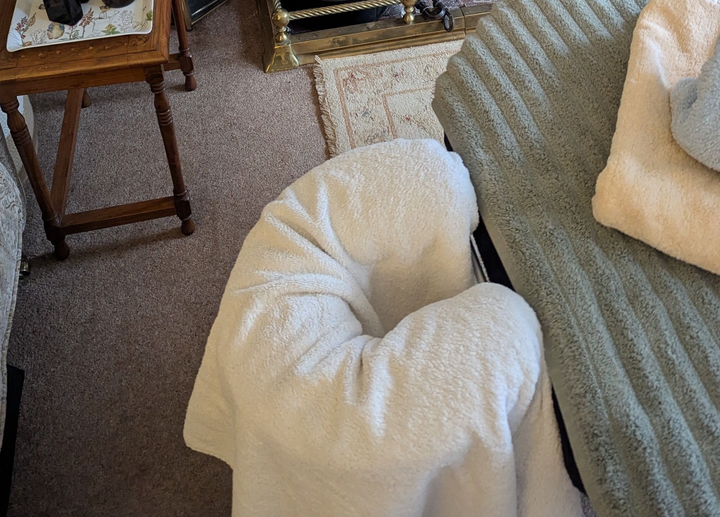 Massage table setup at Liz's Mobile Massage Faversham, Faversham, England, GB with cozy sheets.