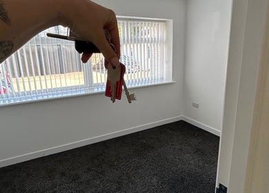 Spacious room at MelissaMcC.Beauty Clydebank, Scotland, GB, showcasing bright sunlight through large windows.
