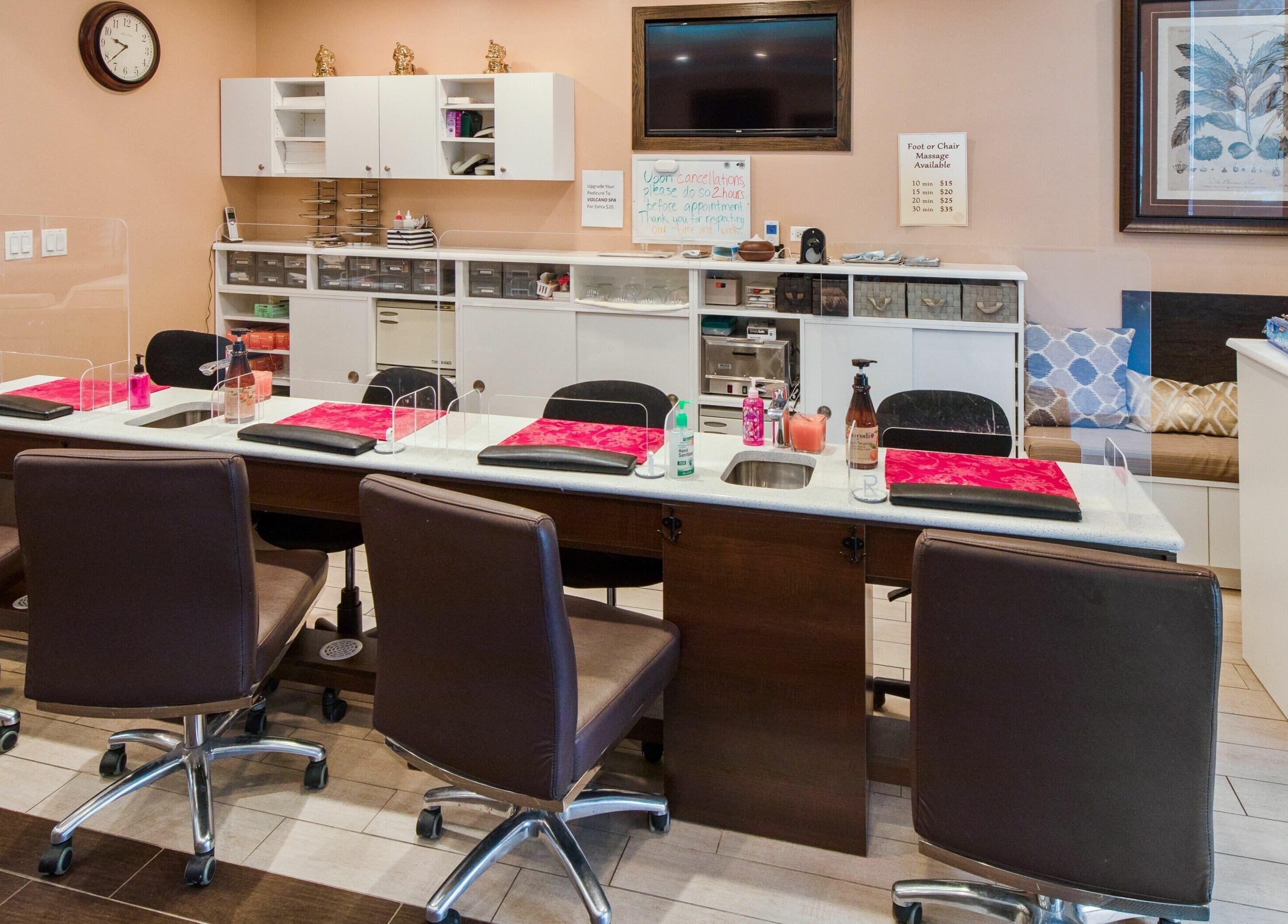 Elegant manicure setup at Ruby Nails in Chicago, Illinois, US with plush seating and modern decor.