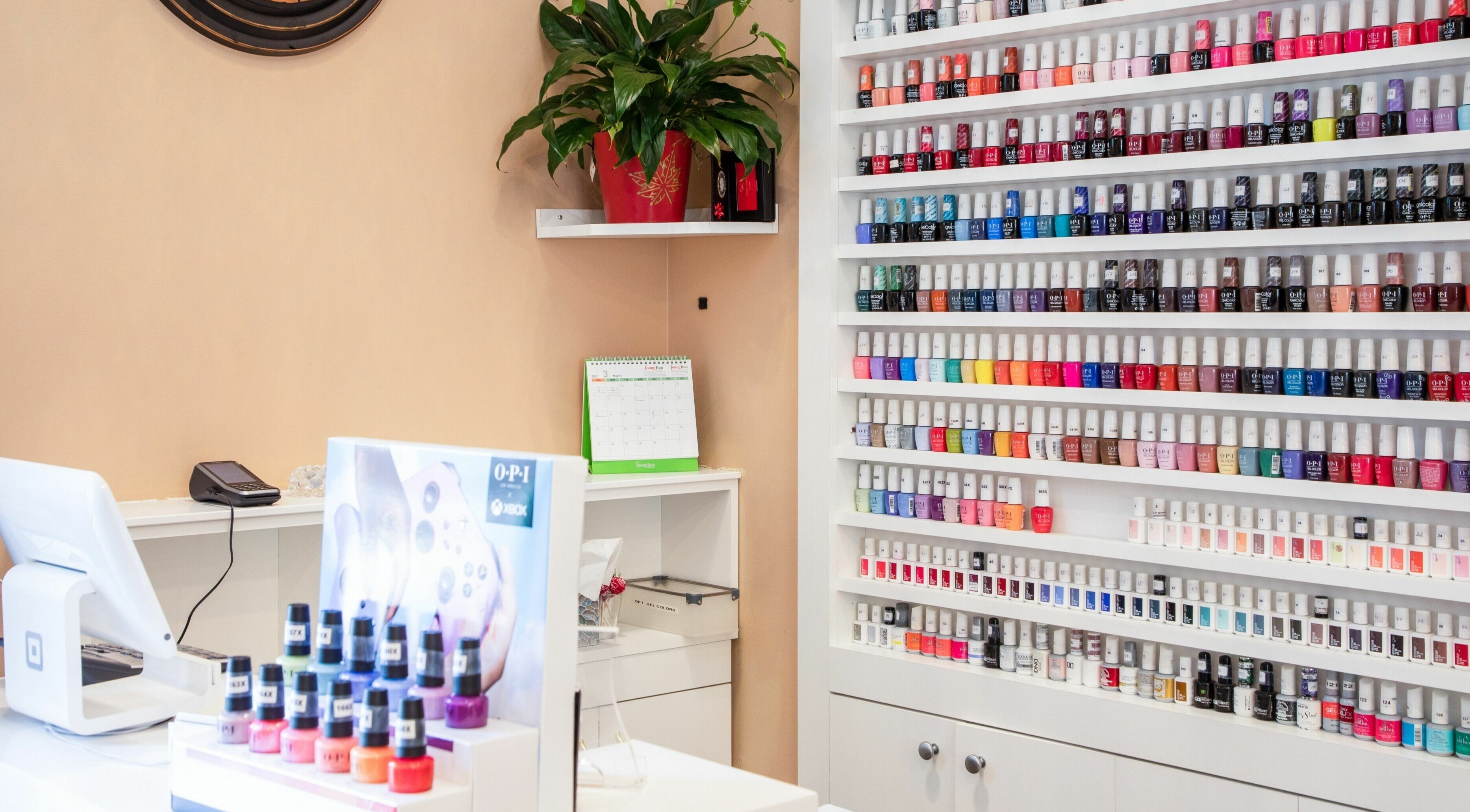 Vibrant nail polish display at Ruby Nails in Chicago, Illinois, US, offering diverse color options.