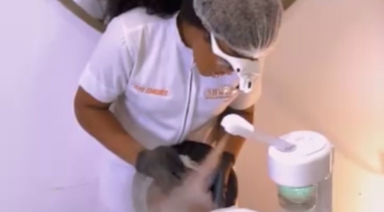 Spa professional in action at Sbwr - Virtual Esthetic Clinic & Mobile Spa, Lagos, NG, offering expert facial care.