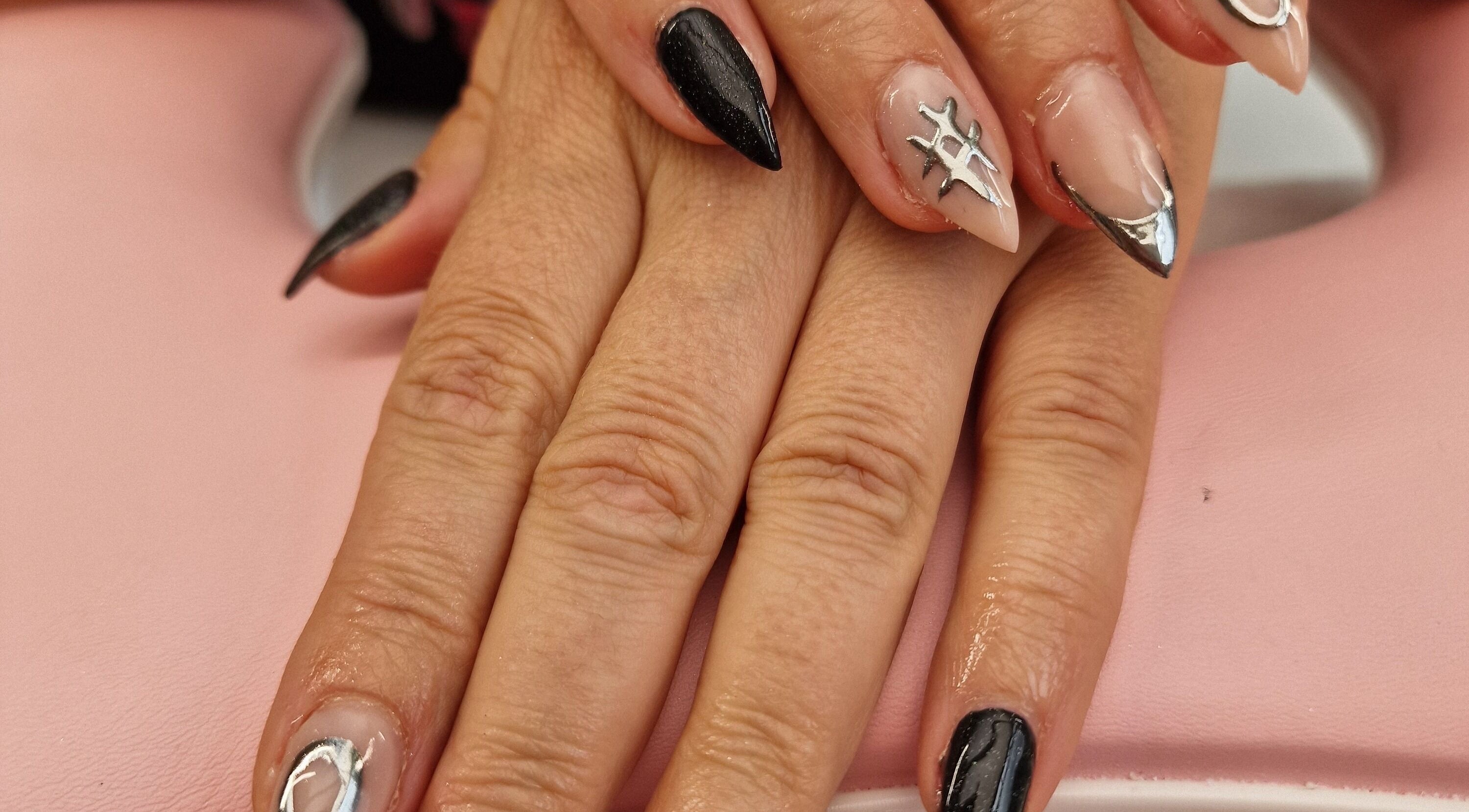 Elegant black and silver nail art at Glamour Nails Telford, Telford, England, GB, showcasing intricate detail.