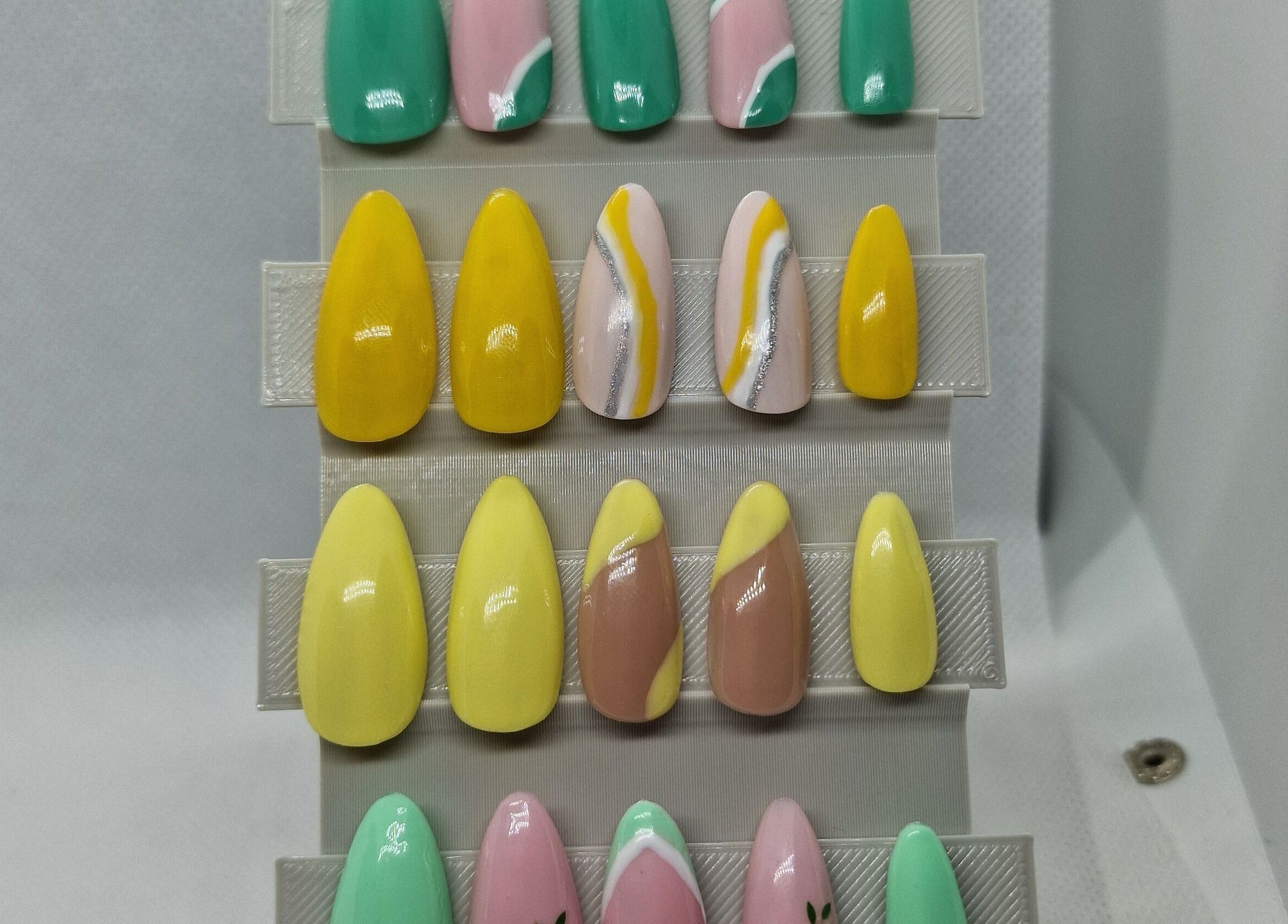 Colorful nail designs at Glamour Nails Telford, Telford, England, GB showcasing vibrant patterns.