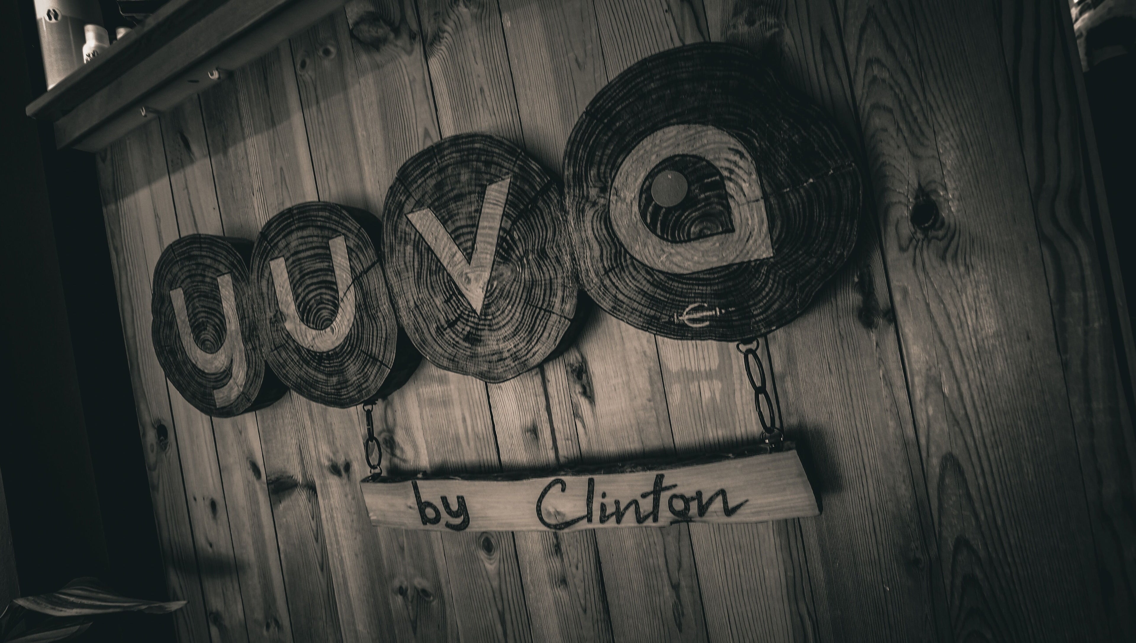 Wooden Yuva by Clinton sign in Ħaż-Żebbuġ, MT displays natural beauty and elegance.
