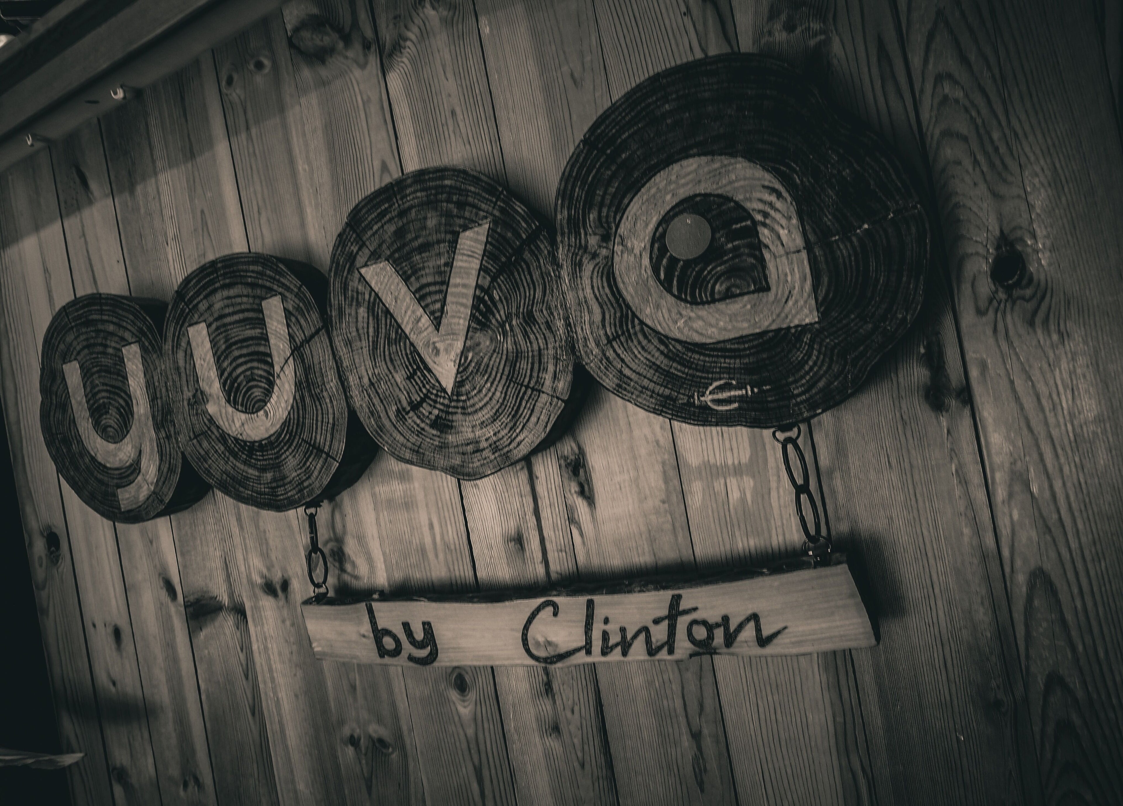 Wooden Yuva by Clinton sign in Ħaż-Żebbuġ, MT displays natural beauty and elegance.
