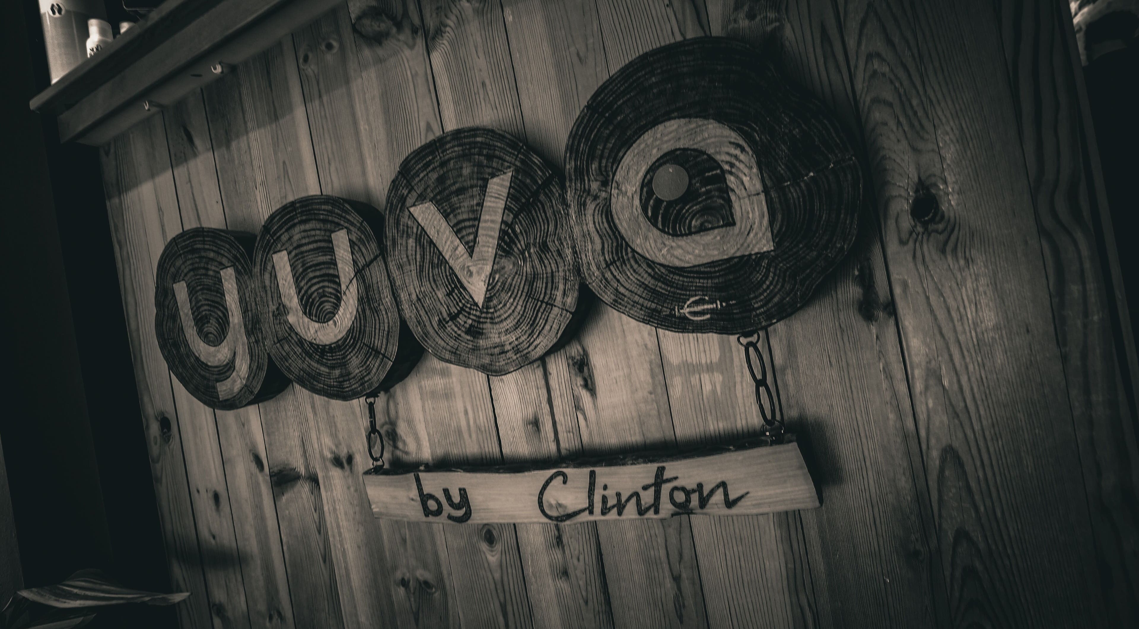Wooden Yuva by Clinton sign in Ħaż-Żebbuġ, MT displays natural beauty and elegance.