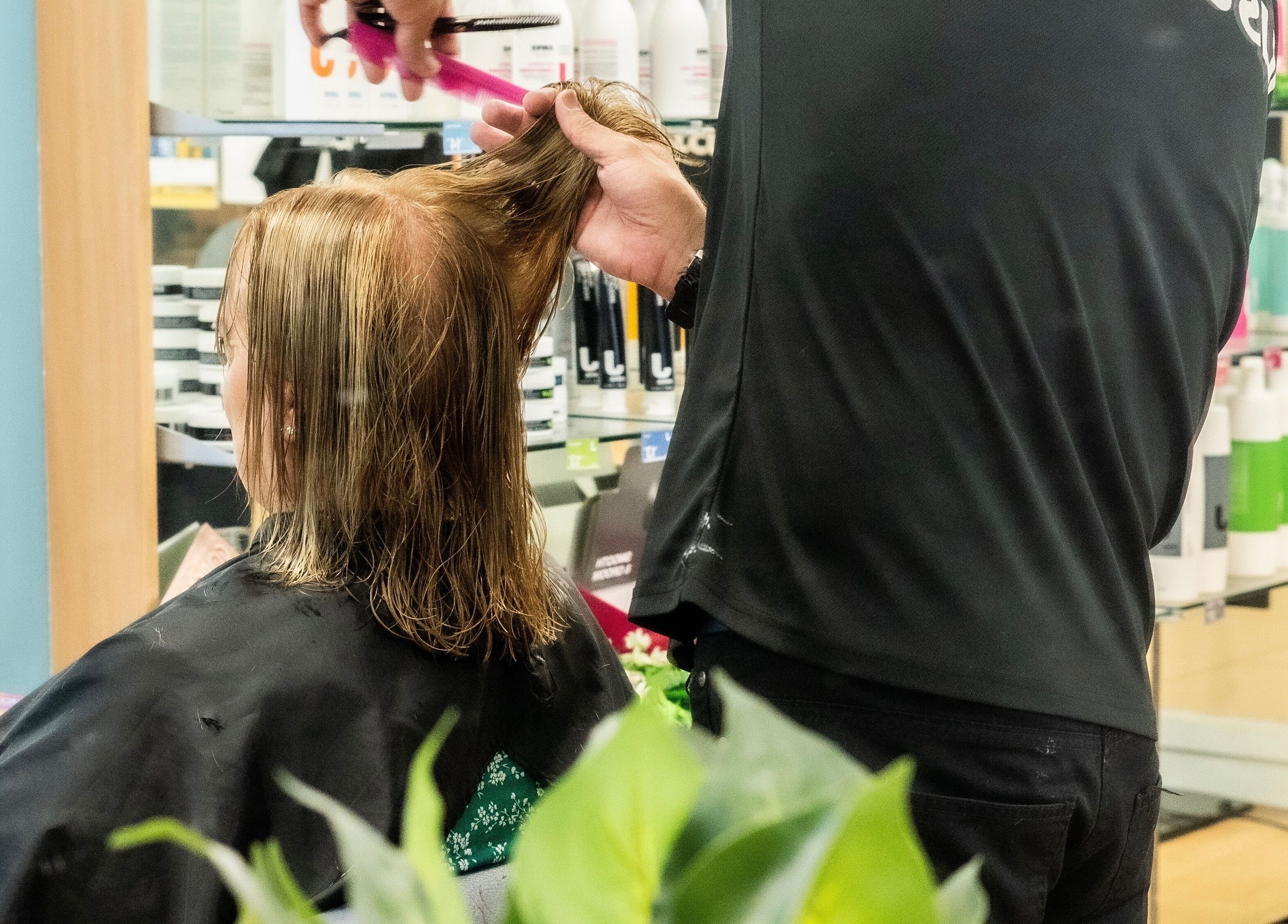 Professional hairstyling at Just Cuts & Colour Blackburn, Blackburn, England, GB.