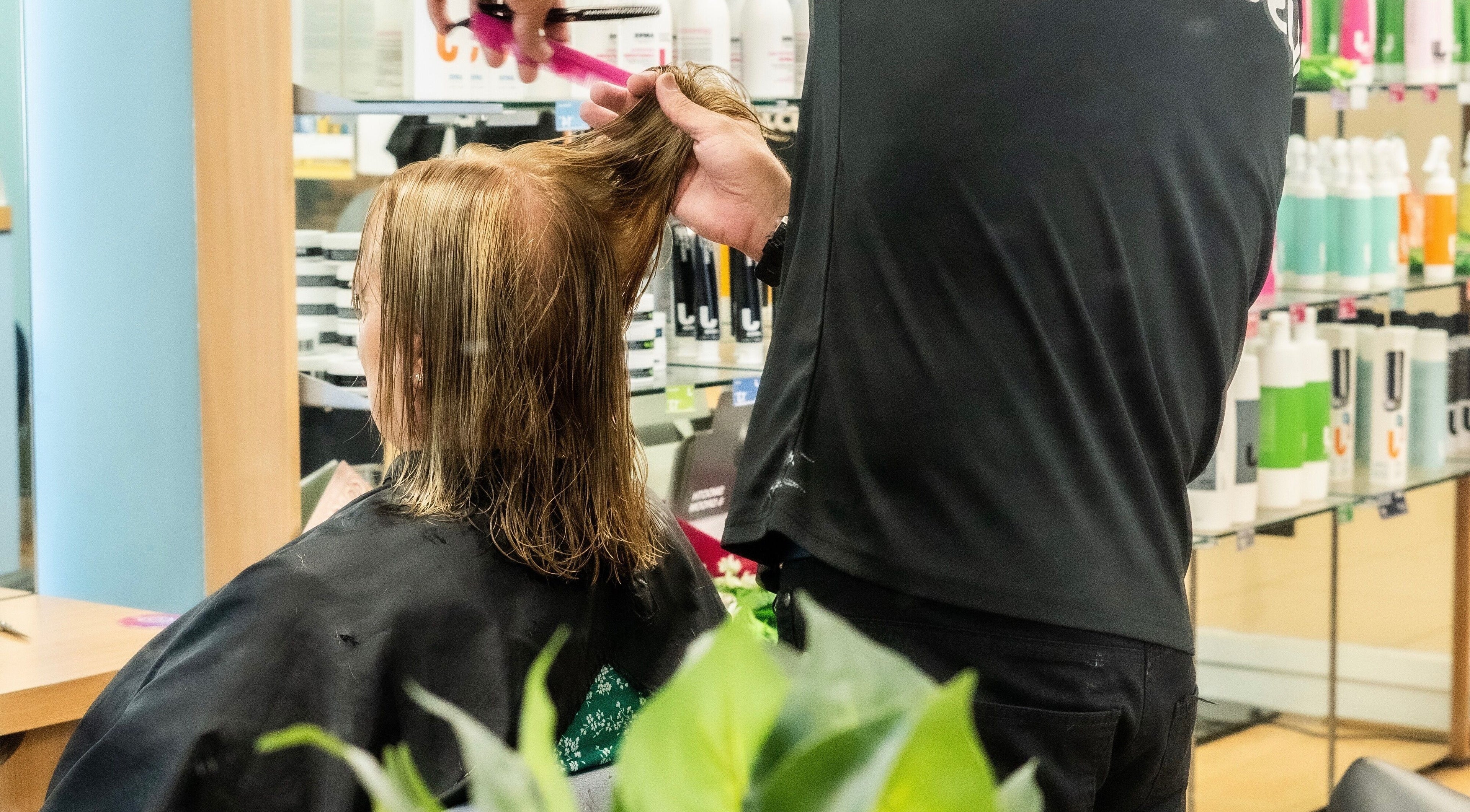 Professional hairstyling at Just Cuts & Colour Blackburn, Blackburn, England, GB.