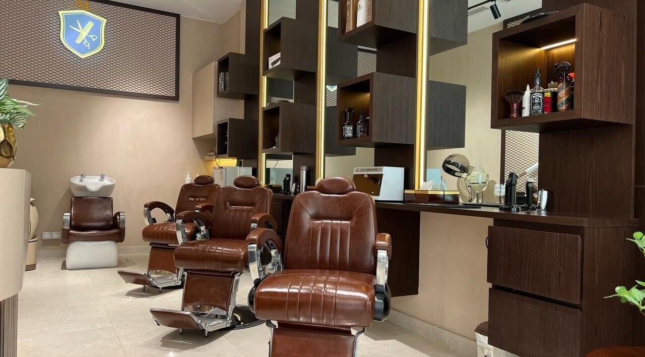 Luxurious barber chairs at The Match Gents Salon, Dubai, AE, offering premium grooming services.