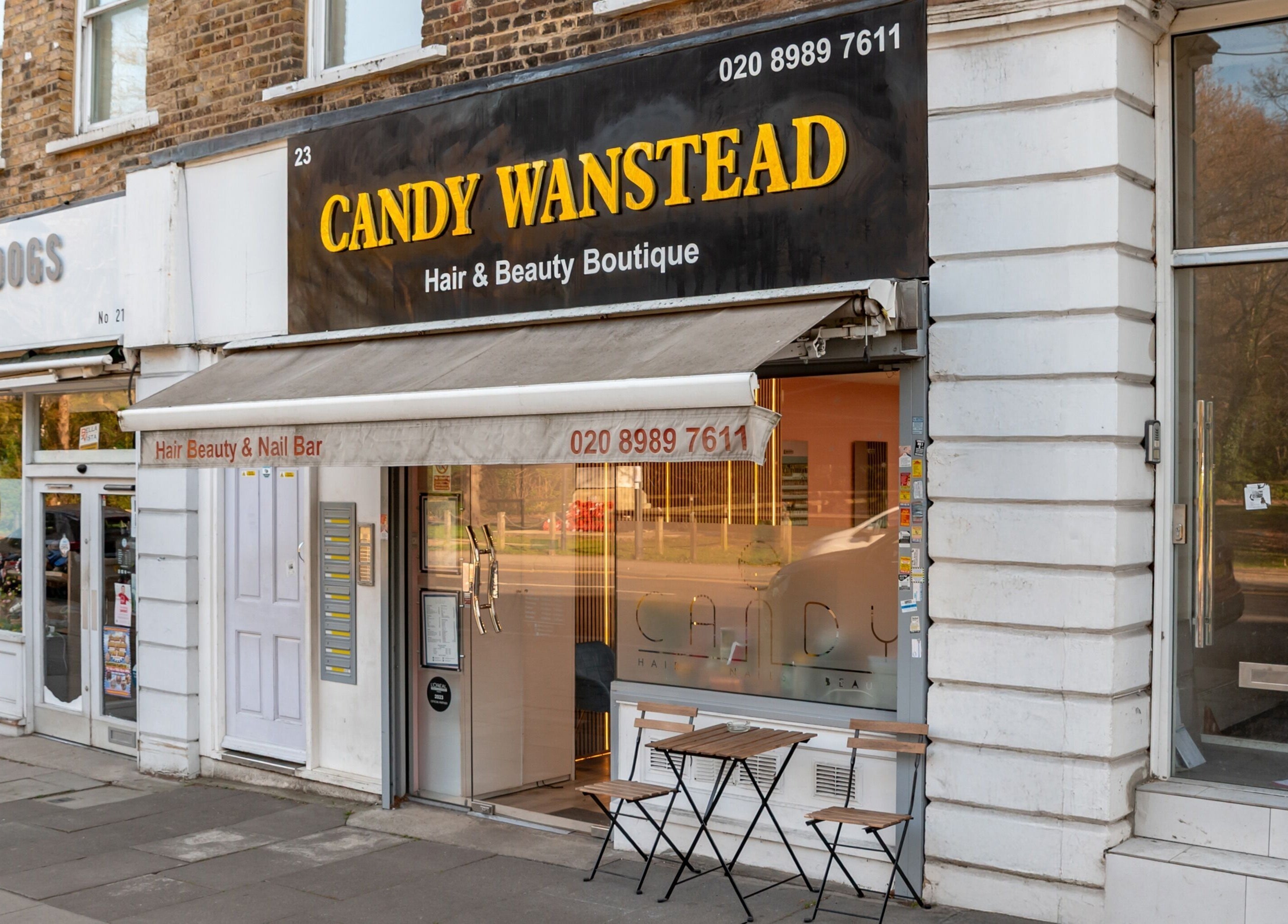 Candy Wanstead beauty salon facade in London, England, GB, showcasing elegant entrance and signage.