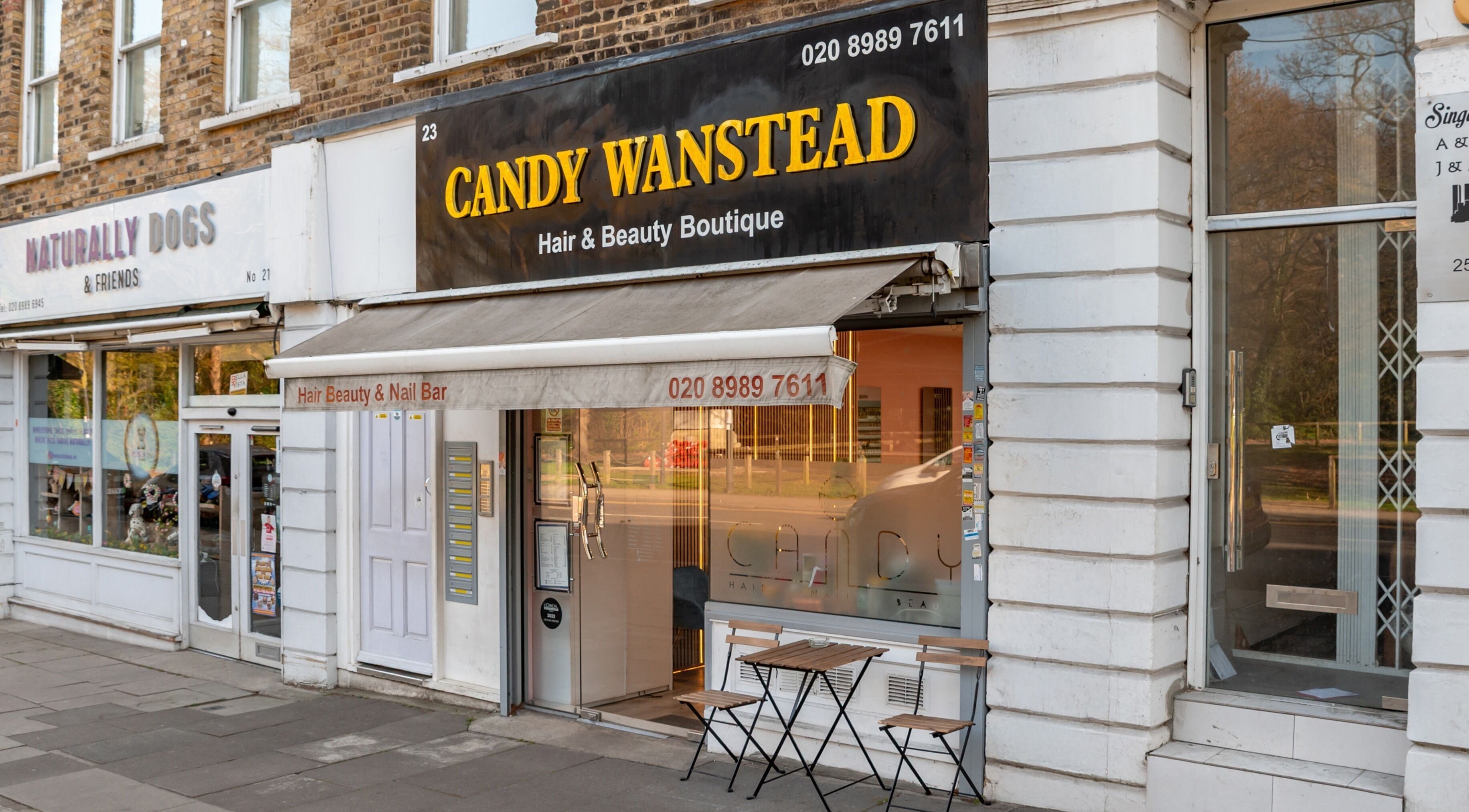 Candy Wanstead beauty salon facade in London, England, GB, showcasing elegant entrance and signage.