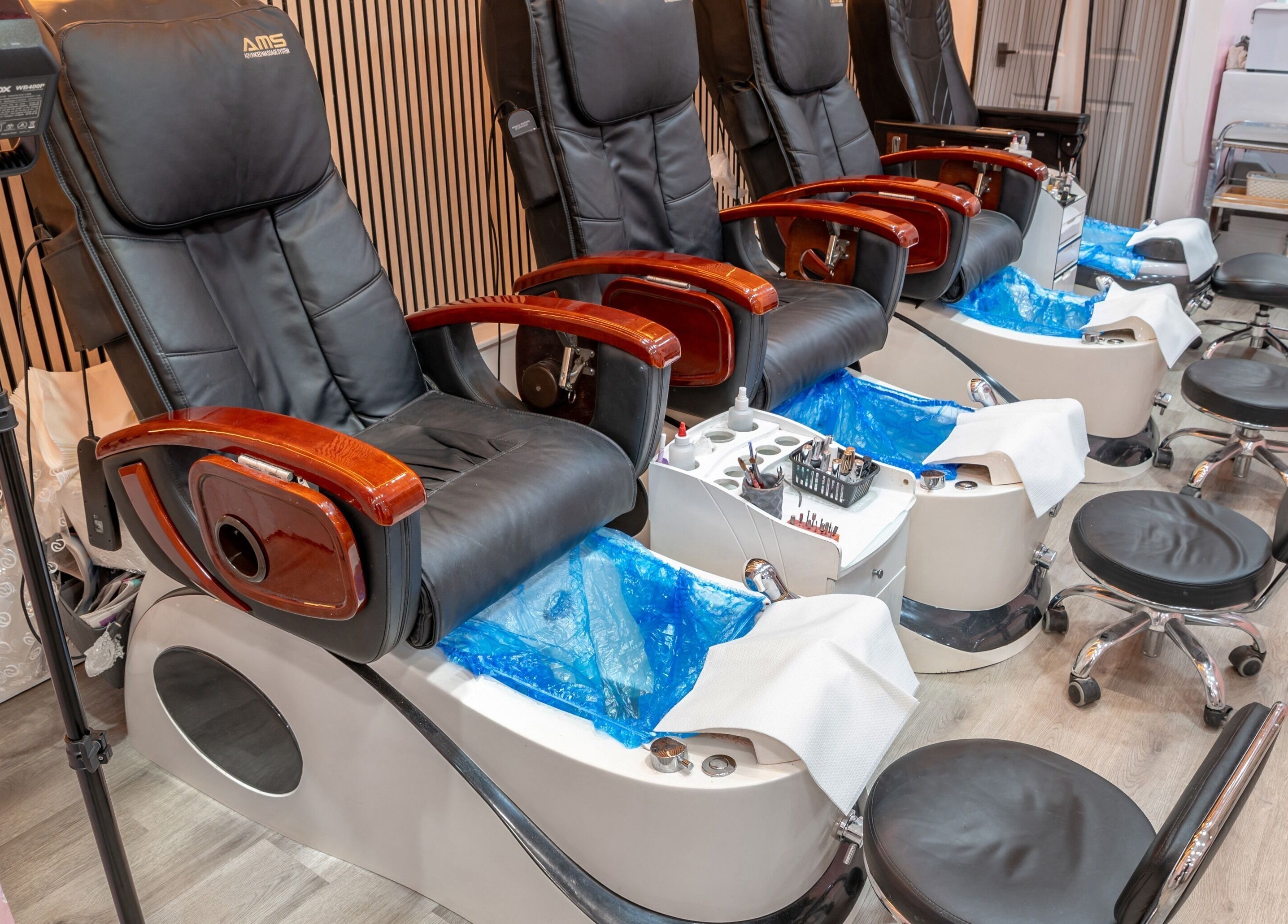 Luxury pedicure chairs at Candy Wanstead, London, England, GB, offering ultimate relaxation.