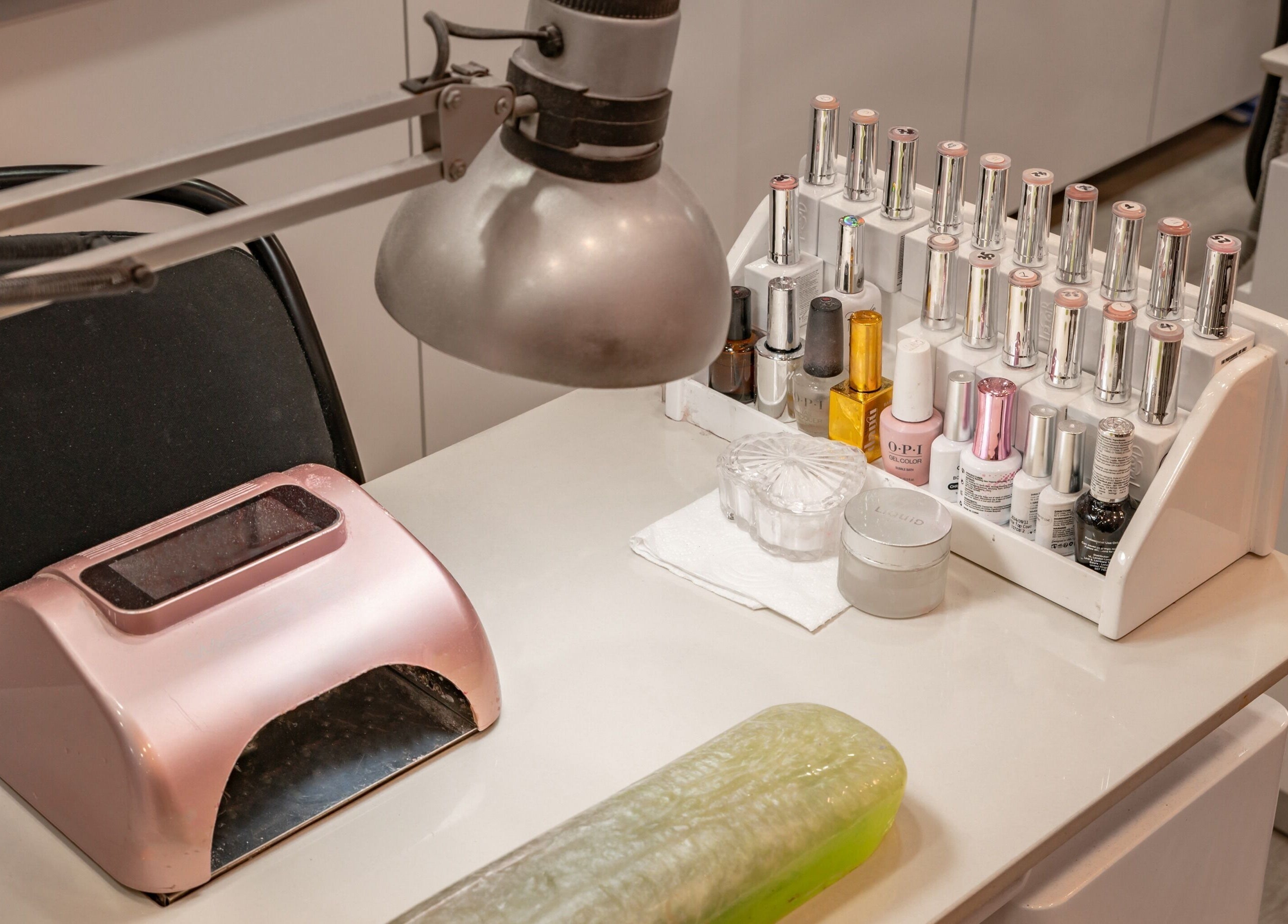 Nail care station at Candy Wanstead, London, England, GB with polish and tools ready for pampering.