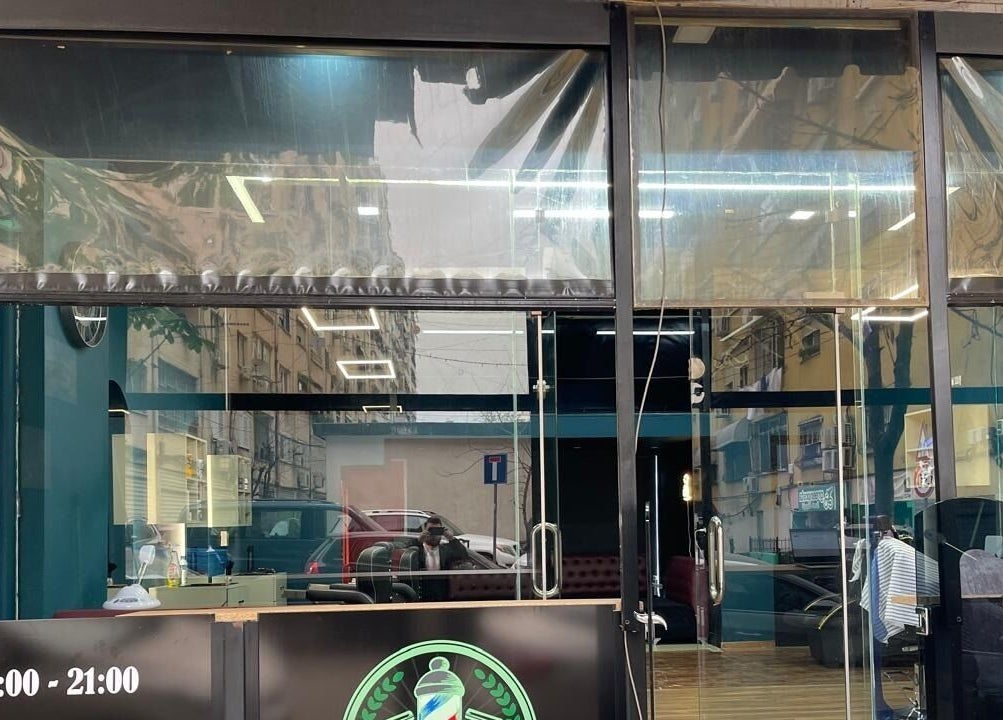 Exterior of Fade Factory in Tiranë, Tirana County, AL with clear glass windows and a modern entrance.