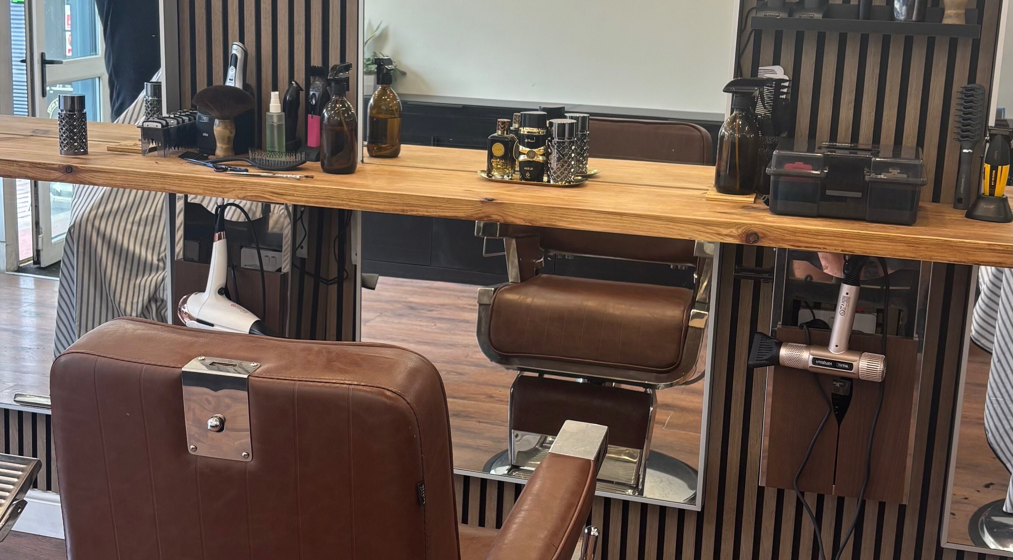 Stylish barber chair at Jodie Jago Barber, Burscough, England, GB showcasing elegant salon setup.