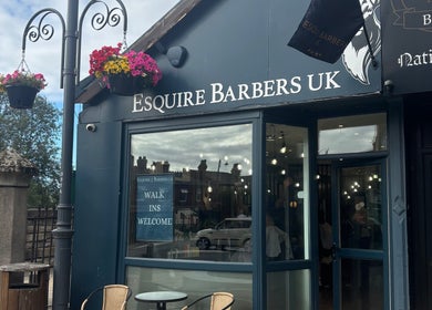 Jodie Jago Barber in Burscough, England, GB features a stylish storefront with inviting decor and welcoming signage.