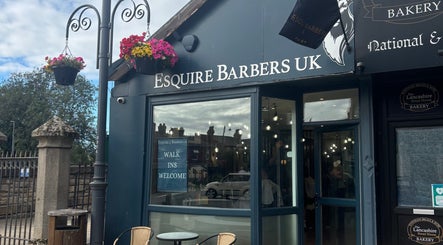 Jodie Jago Barber in Burscough, England, GB features a stylish storefront with inviting decor and welcoming signage.
