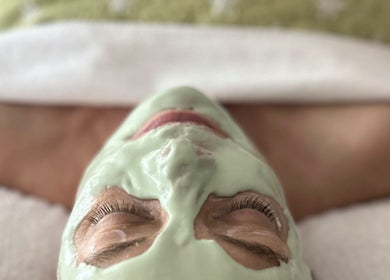 Relaxing facial at Facials By Tina Maria in Freeport, Freeport, BS with soothing green mask application.