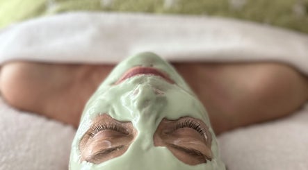 Relaxing facial at Facials By Tina Maria in Freeport, Freeport, BS with soothing green mask application.