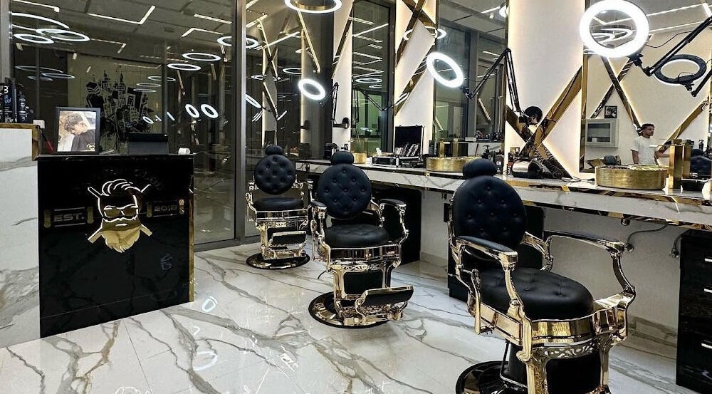 Luxurious interior of Little Barberclub - By Ouss barber in Dubai, Dubai, AE featuring elegant barber chairs.