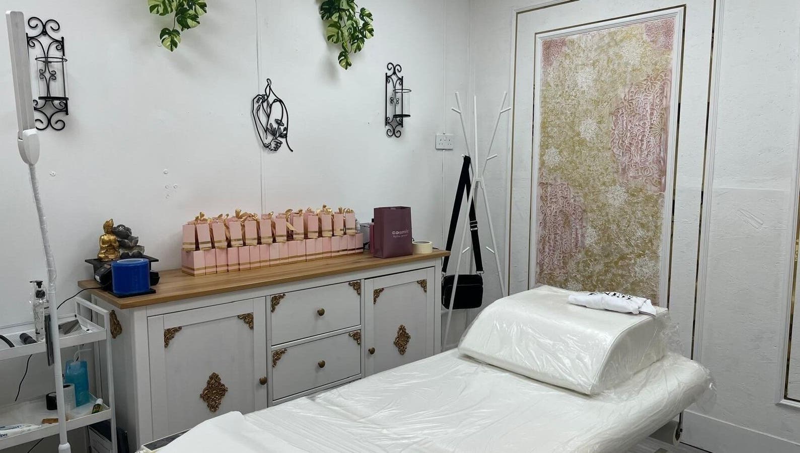 Tranquil interior of The Aeon Aesthetics in Southall, England, GB showcasing a stylish treatment room.