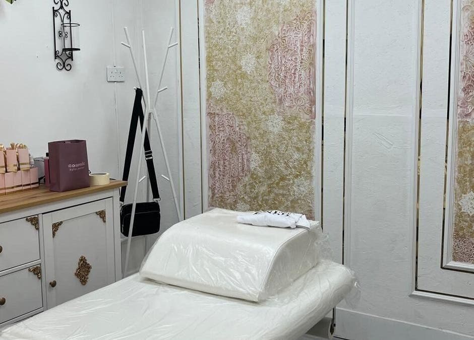 Elegant treatment room at The Aeon Aesthetics, Southall, England, GB showcasing decor and comfortable bed.