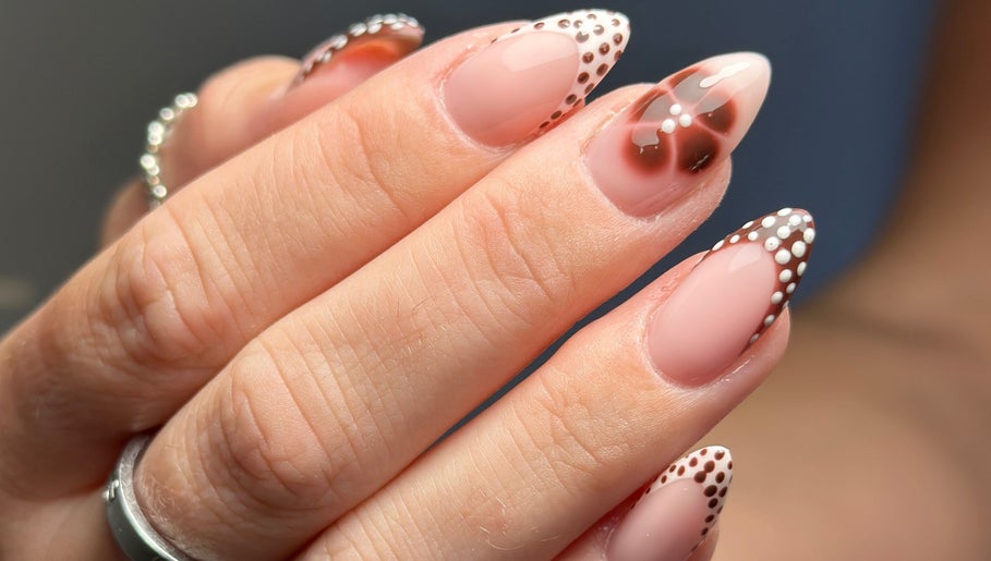 Elegant nail art with polka dots at Nail Studio 9, Kingskerswell, England, GB.