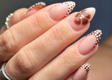 Elegant nail art with polka dots at Nail Studio 9, Kingskerswell, England, GB.
