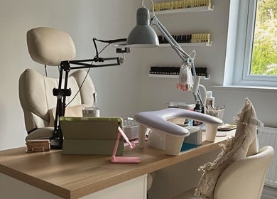 Tranquil nail workstation at Nail Studio 9, Kingskerswell, England, GB with natural light and cozy decor.