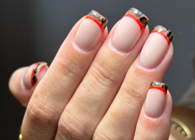 Stylish leopard print nails at Nail Studio 9, Kingskerswell, England, GB offer a unique beauty experience.