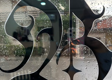 Artistic design on rainy window at Bizzarbika Nails, Zagreb, Grad Zagreb, HR.