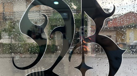 Artistic design on rainy window at Bizzarbika Nails, Zagreb, Grad Zagreb, HR.