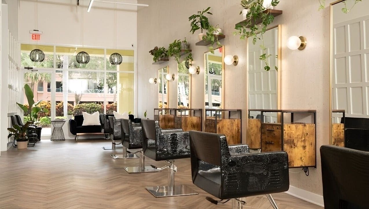 Spacious salon interior with stylish chairs at Yani Mendez x Vion Salon, Boca Raton, Florida, US.