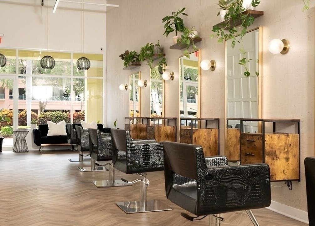 Spacious salon interior with stylish chairs at Yani Mendez x Vion Salon, Boca Raton, Florida, US.