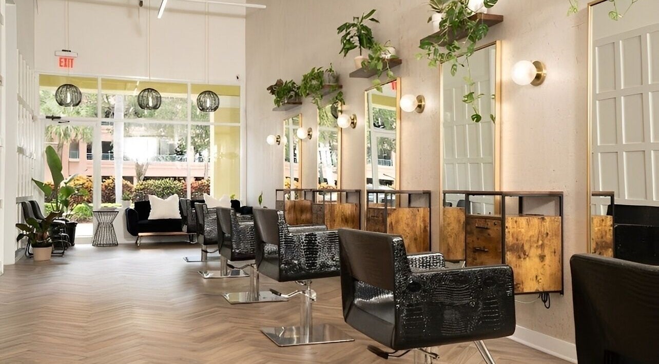 Spacious salon interior with stylish chairs at Yani Mendez x Vion Salon, Boca Raton, Florida, US.